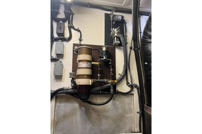 Slide: The Image of Engine room of 1985 Hatteras 58 Motor Yacht with fuel filtration system. - 39