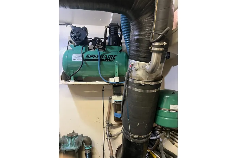 Slide: The Image of Engine room of 1985 Hatteras 58 Motor Yacht with Speedaire compressor. - 40