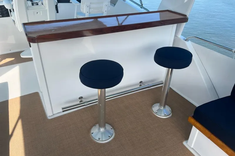 Slide: The Image of Bar stools on the deck of a 1985 Hatteras 58 Motor Yacht. - 8