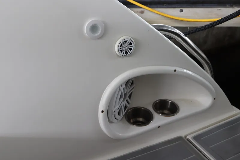 Slide: The Image of 2014 Intermarine 380 Sport boat detail with speakers and cup holders. - 11