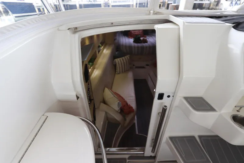 Slide: The Image of Interior view of 2014 Intermarine 380 Sport yacht, featuring cabin entrance and seating area. - 26