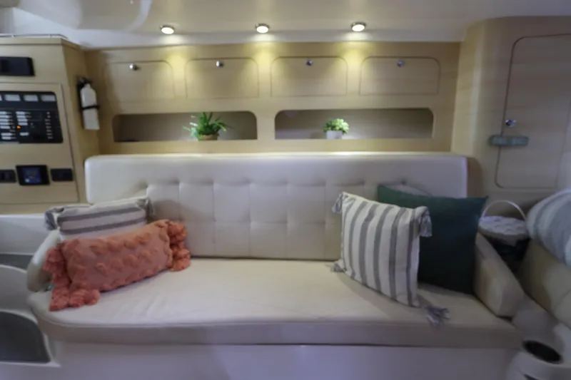Slide: The Image of Luxurious interior of 2014 Intermarine 380 Sport yacht with plush seating and decorative pillows. - 27