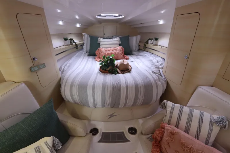 Slide: The Image of Luxurious cabin interior of 2014 Intermarine 380 Sport yacht with cozy bedding and decor. - 28