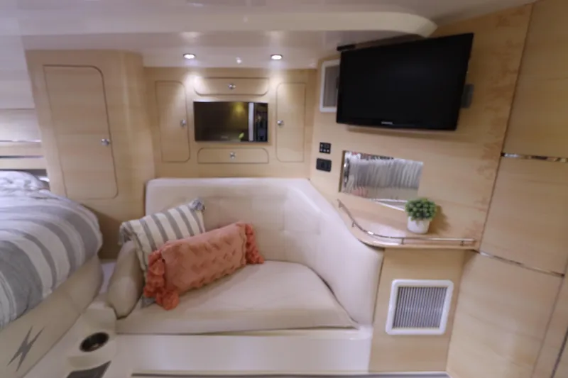 Slide: The Image of Luxurious 2014 Intermarine 380 Sport yacht interior with cozy seating, TV, and modern decor. - 29