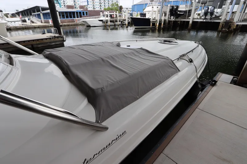 Slide: The Image of 2014 Intermarine 380 Sport yacht docked with protective cover, marina background. - 4
