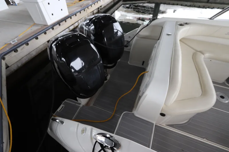 Slide: The Image of 2014 Intermarine 380 Sport boat with dual outboard motors docked. - 9