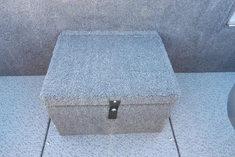 Slide: The Image of Gray carpeted storage box in 2026 Lund 1975 Renegade boat interior. - 19