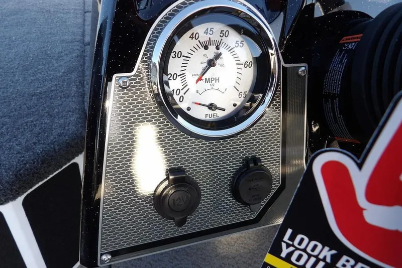 Slide: The Image of Dashboard of 2026 Lund 1975 Renegade boat with speedometer and fuel gauge. - 21