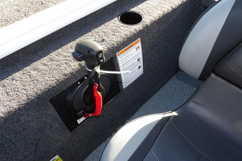 Slide: The Image of Interior of 2026 Lund 1975 Renegade boat with control panel and seating. - 25