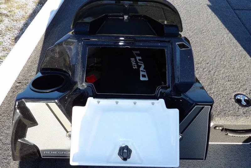 Slide: The Image of 2026 Lund 1975 Renegade boat interior with storage compartment and cup holder. - 28
