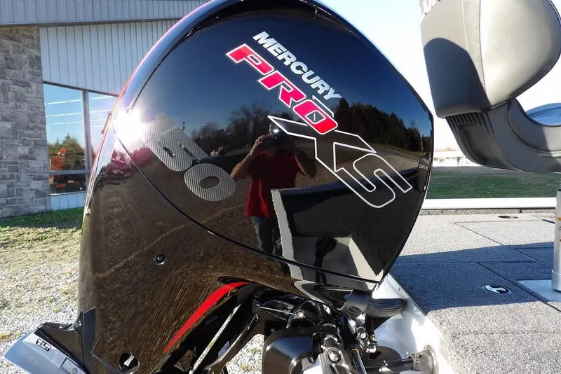 Slide: The Image of Mercury Pro XS engine on 2026 Lund 1975 Renegade boat, outdoor setting. - 53