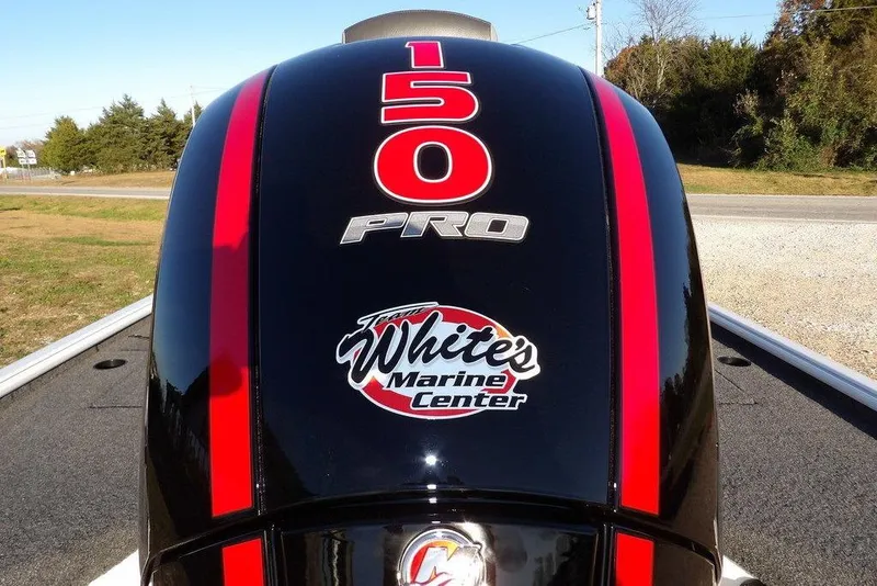 Slide: The Image of Outboard motor with "150 PRO" and "White's Marine Center" logo, Lund 1975 Renegade 2026 model. - 56