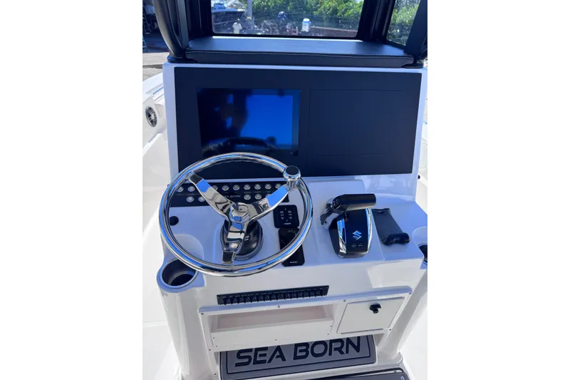 Slide: The Image of 2026 Sea Born LX24 Center Console dashboard with steering wheel and controls. - 14