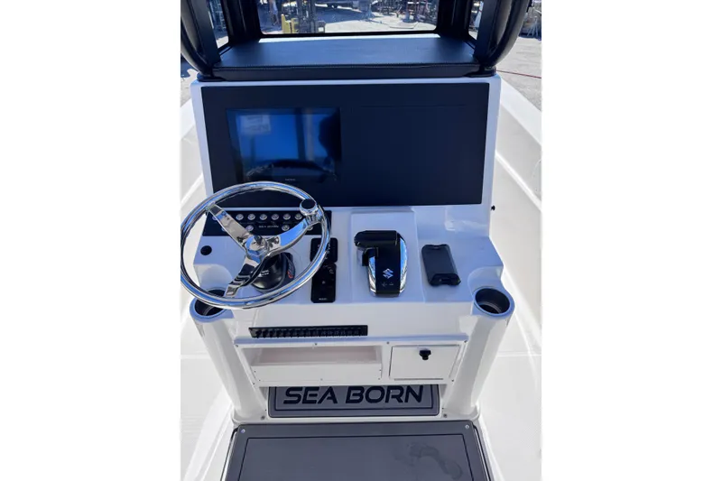 Slide: The Image of 2026 Sea Born LX24 Center Console boat dashboard with steering wheel and controls. - 15