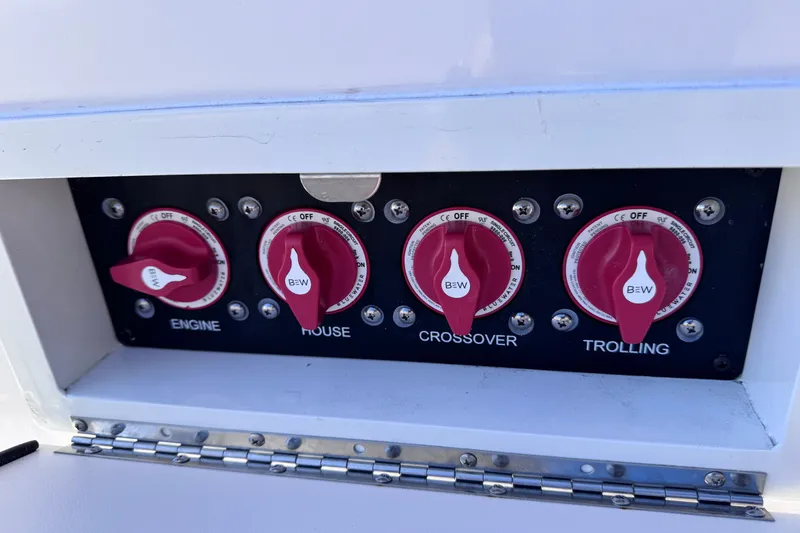 Slide: The Image of Control panel of 2026 Sea Born LX24 Center Console with engine, house, crossover, trolling switches. - 28