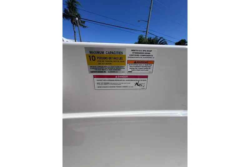 Slide: The Image of 2026 Sea Born LX24 Center Console capacity warning label, 10 persons or 1442 lbs. - 30