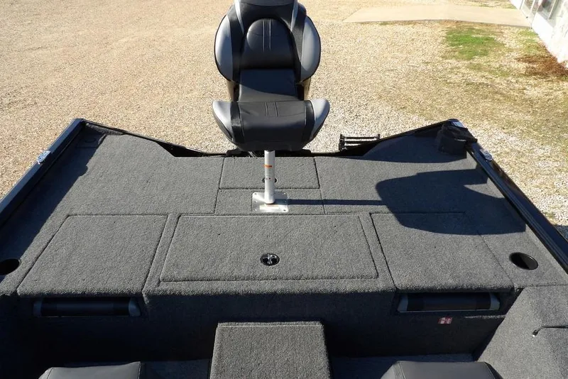 Slide: The Image of 2026 Lund 1975 Renegade boat interior with seating and storage compartments. - 15