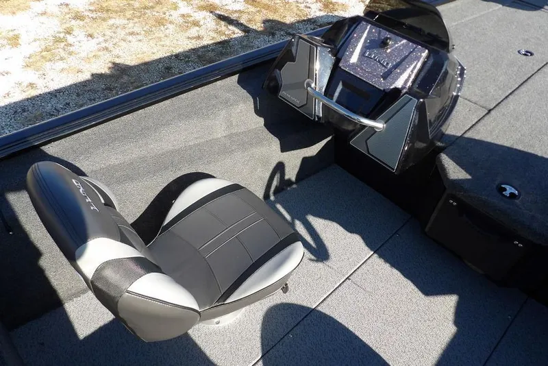 Slide: The Image of Interior of 2026 Lund 1975 Renegade boat with modern seating and console. - 26