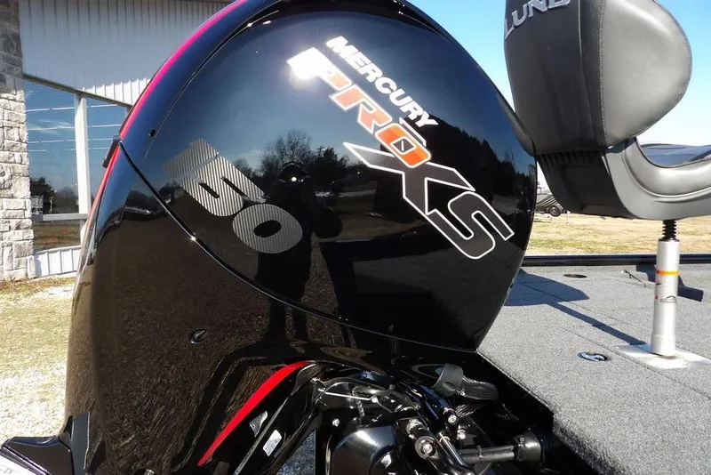 Slide: The Image of Mercury Pro XS engine on 2026 Lund 1975 Renegade boat, outdoor setting. - 50