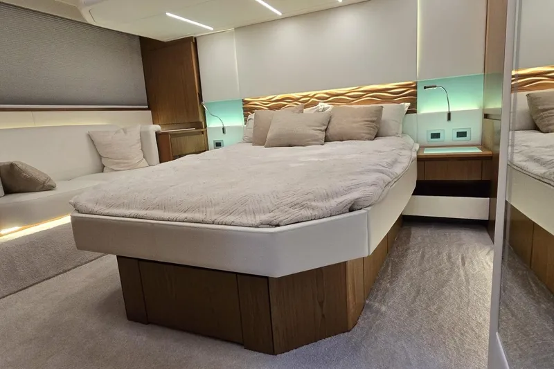 Slide: The Image of Luxurious 2024 Tiara Yachts EX 60 bedroom with modern design and elegant lighting. - 56