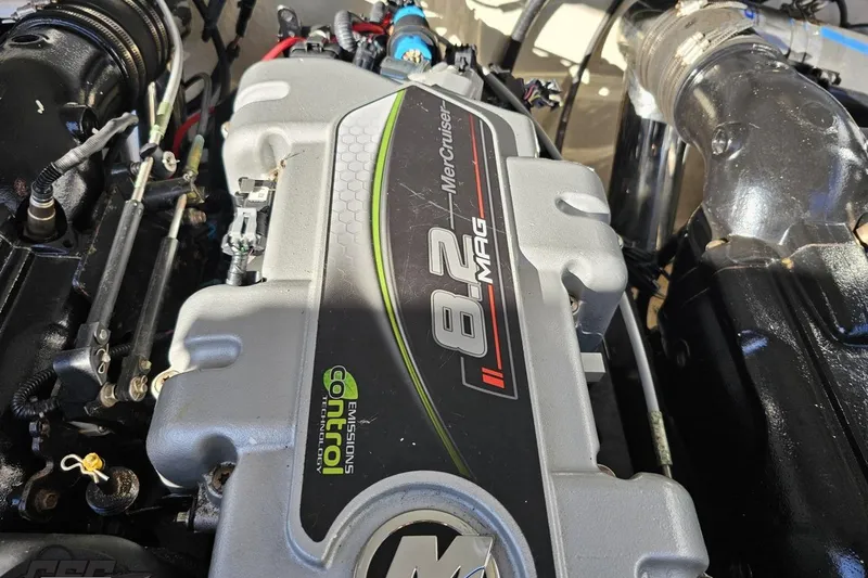Slide: The Image of Close-up of a MerCruiser 8.2 MAG engine in a 2015 Monterey 288SS Super Sport boat. - 102