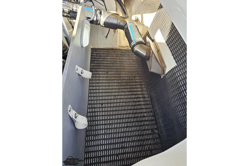 Slide: The Image of Engine compartment of 2015 Monterey 288SS Super Sport boat with visible components. - 103