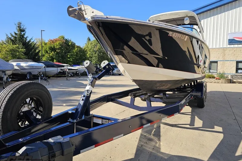 Slide: The Image of 2015 Monterey 288SS Super Sport boat on trailer in sunny outdoor setting. - 11