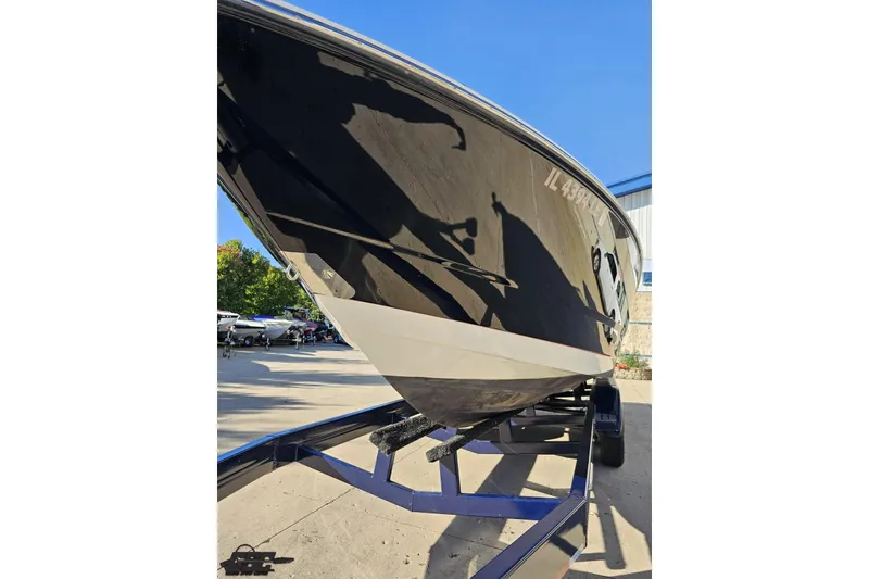 Slide: The Image of 2015 Monterey 288SS Super Sport boat on trailer, side view in sunlight. - 12