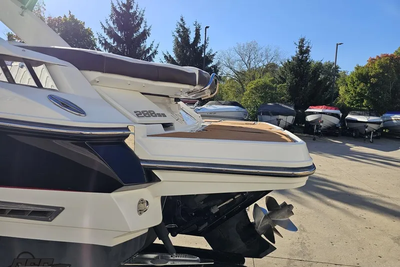 Slide: The Image of 2015 Monterey 288SS Super Sport boat in a sunny outdoor setting. - 23