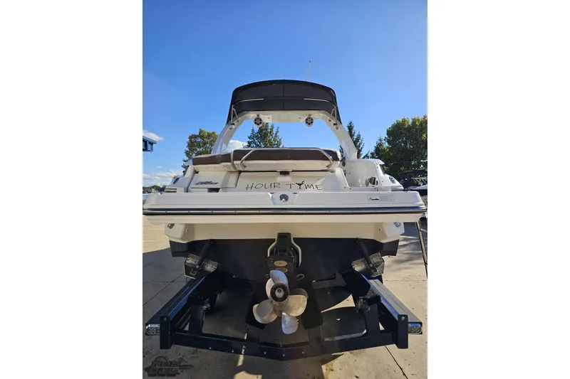 Slide: The Image of 2015 Monterey 288SS Super Sport boat on trailer, rear view under clear blue sky. - 25