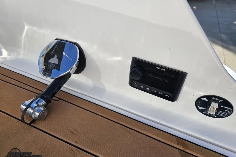 Slide: The Image of 2015 Monterey 288SS Super Sport boat controls and audio system on deck. - 39