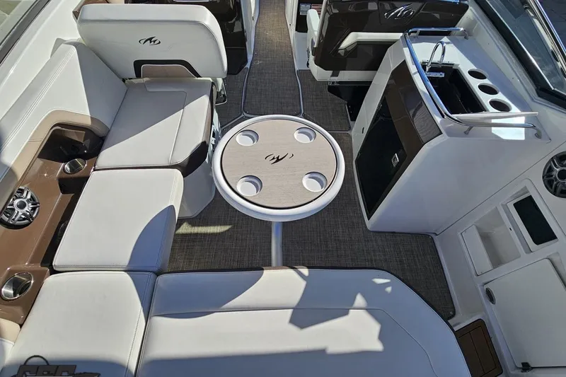 Slide: The Image of Interior of 2015 Monterey 288SS Super Sport boat with seating and table. - 44