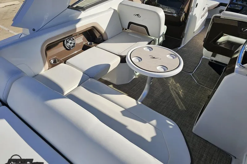 Slide: The Image of Luxurious interior of 2015 Monterey 288SS Super Sport boat with seating and table. - 45