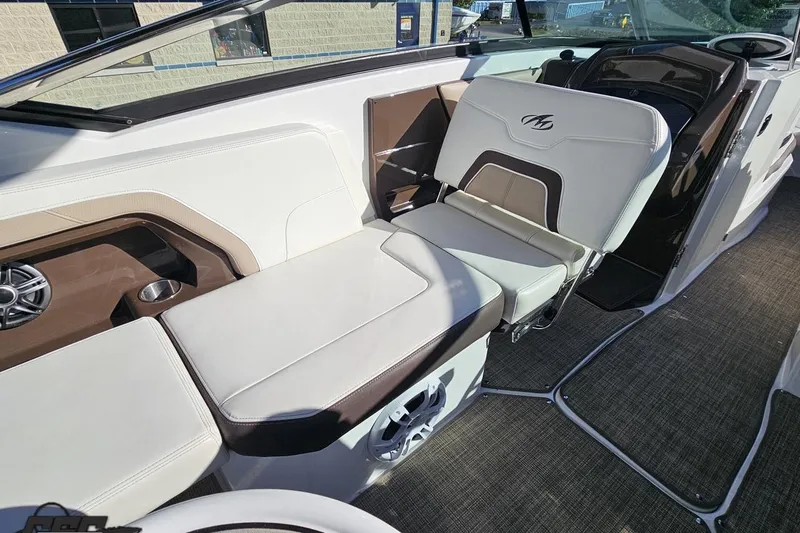 Slide: The Image of 2015 Monterey 288SS Super Sport boat interior with white and brown seating. - 47