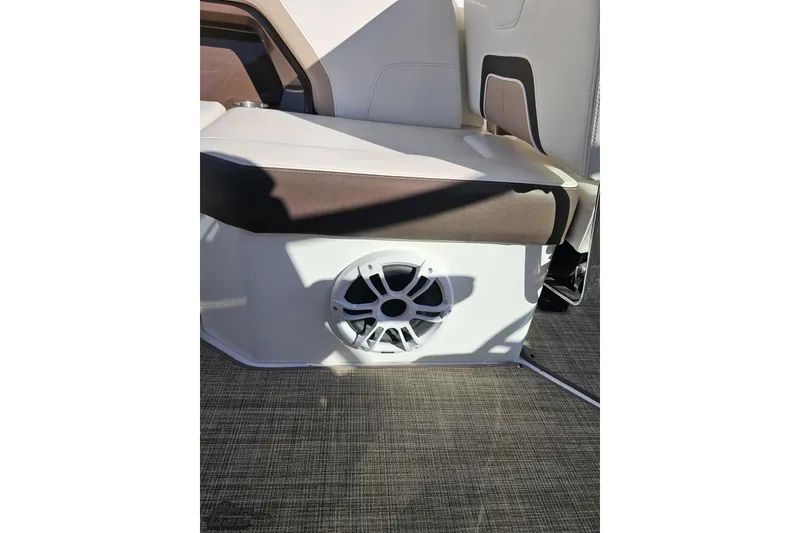 Slide: The Image of 2015 Monterey 288SS Super Sport boat interior with speaker and cushioned seating. - 49