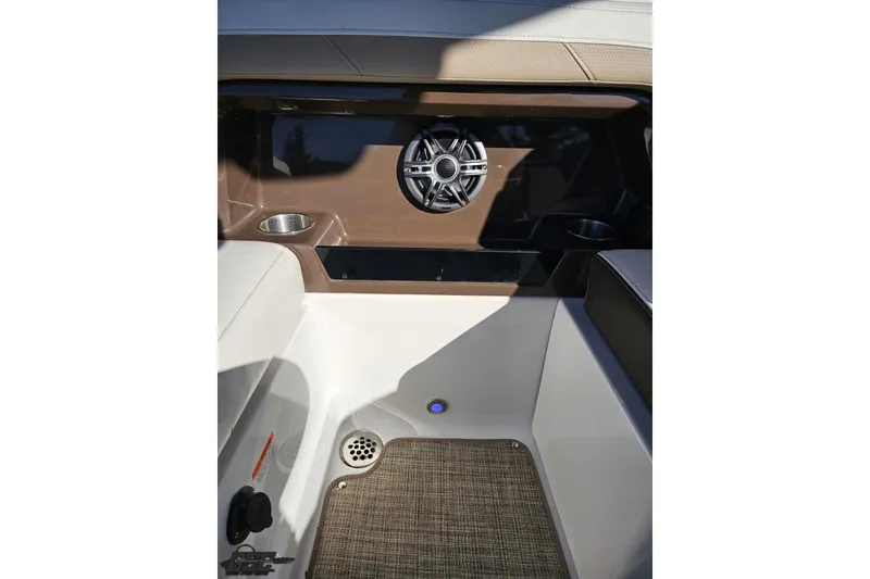 Slide: The Image of Interior of 2015 Monterey 288SS Super Sport boat with speaker and cup holders. - 60