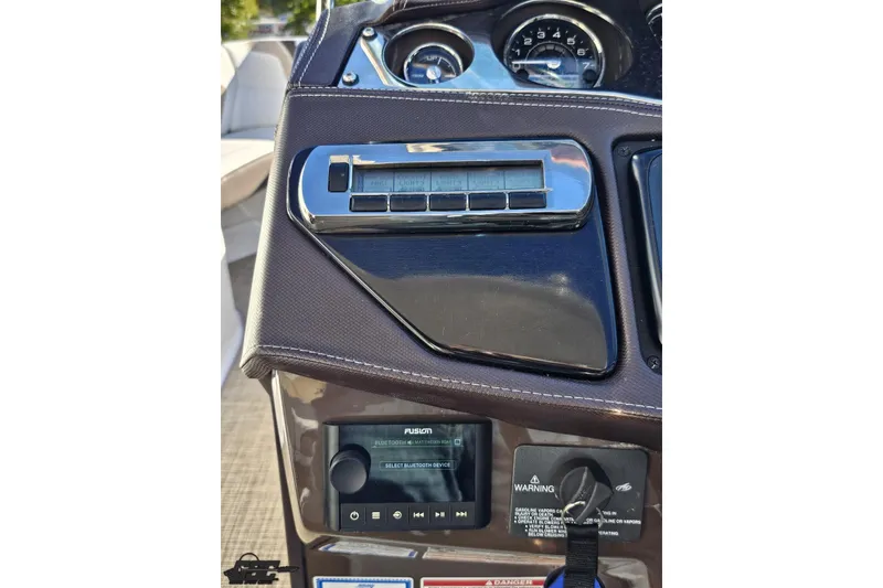 Slide: The Image of Dashboard of 2015 Monterey 288SS Super Sport boat with controls and gauges. - 73