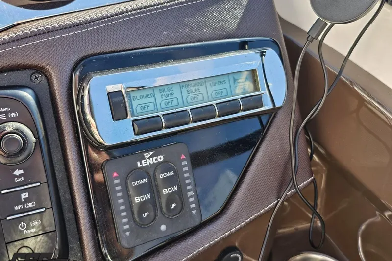 Slide: The Image of Control panel of a 2015 Monterey 288SS Super Sport boat dashboard. - 75