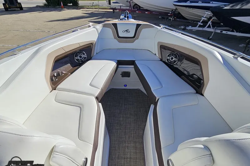 Slide: The Image of 2015 Monterey 288SS Super Sport boat interior with white seating and speakers. - 81
