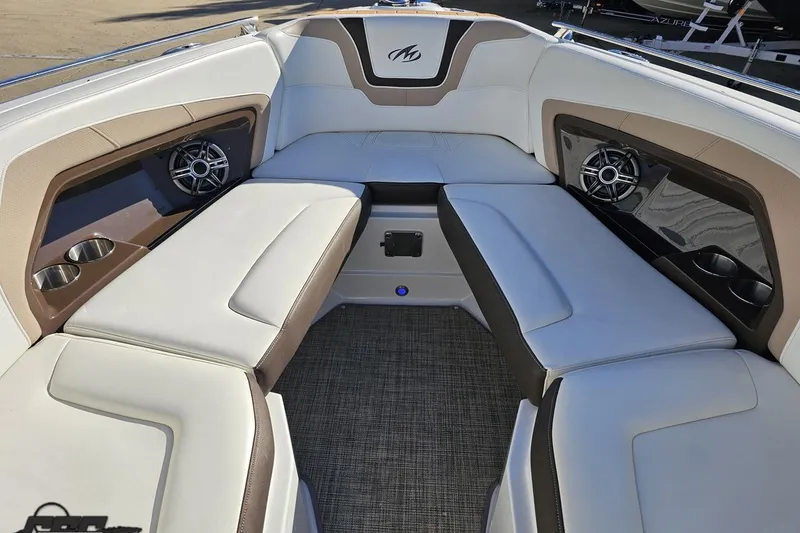 Slide: The Image of Interior of 2015 Monterey 288SS Super Sport boat with cushioned seating and speakers. - 82