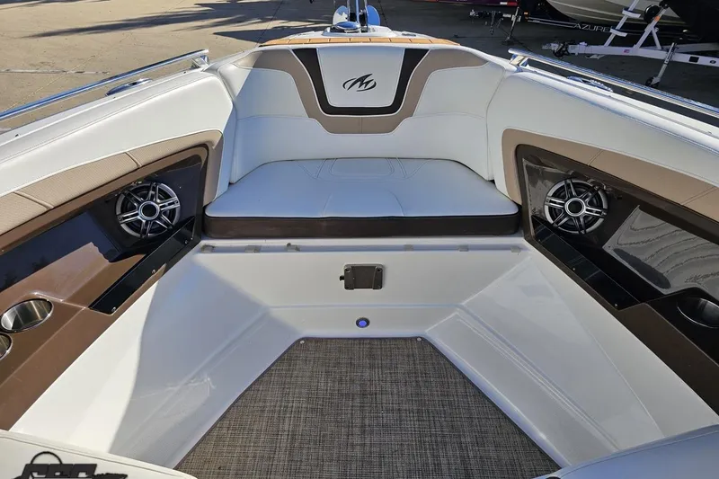 Slide: The Image of Interior of 2015 Monterey 288SS Super Sport boat with cushioned seating and speakers. - 83