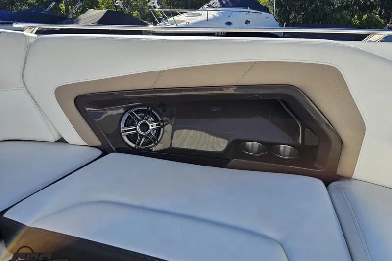 Slide: The Image of 2015 Monterey 288SS Super Sport boat interior with speaker and cup holders. - 85