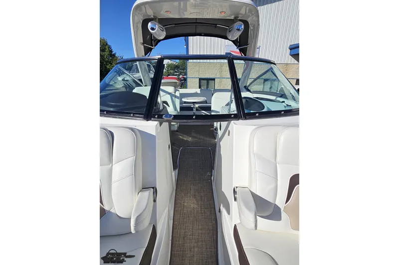 Slide: The Image of 2015 Monterey 288SS Super Sport boat interior with white seating and open cockpit. - 92