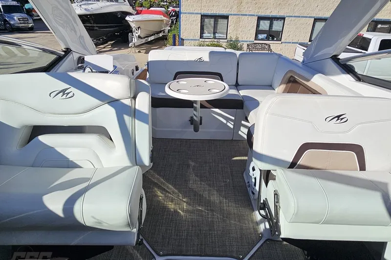 Slide: The Image of 2015 Monterey 288SS Super Sport boat interior with seating and table. - 94