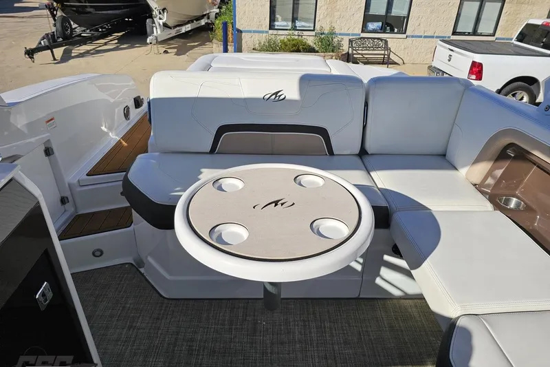 Slide: The Image of 2015 Monterey 288SS Super Sport boat interior with seating and table. - 96