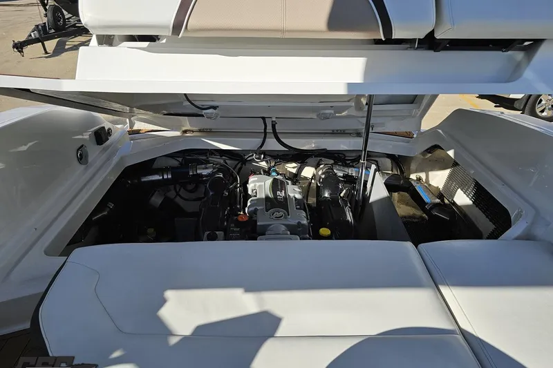 Slide: The Image of 2015 Monterey 288SS Super Sport boat engine compartment, open hatch view. - 99