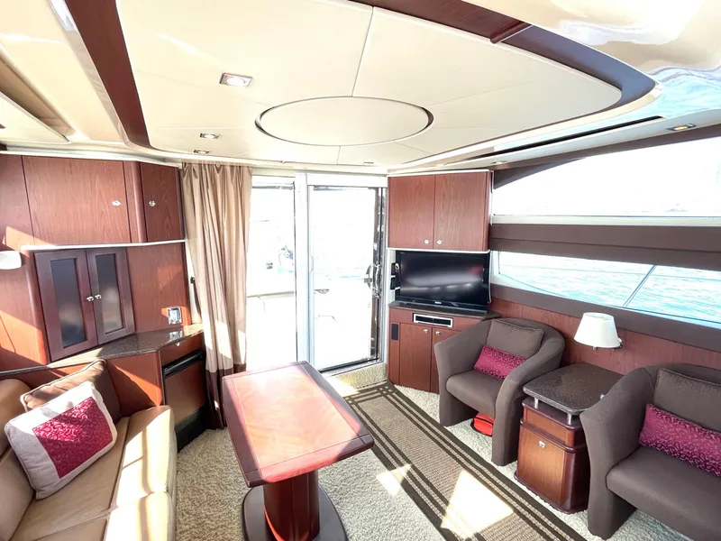 Slide: The Image of Luxurious interior of a 2012 Meridian 441 Sedan yacht with modern furnishings. - 11
