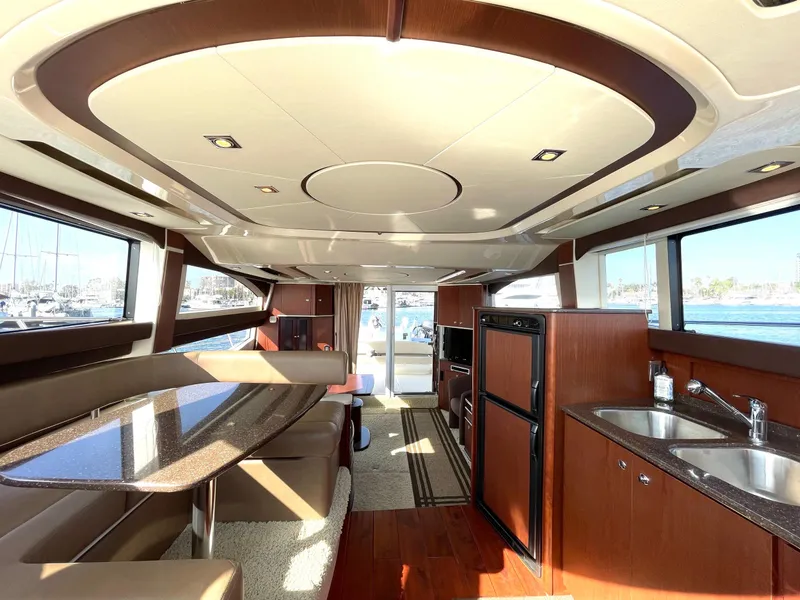 Slide: The Image of Luxurious interior of a 2012 Meridian 441 Sedan yacht with modern amenities. - 13