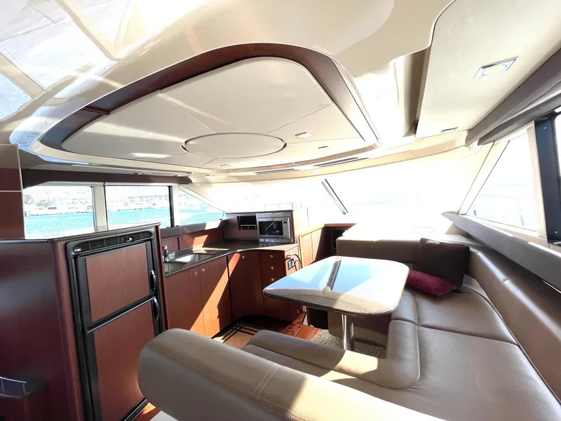 Slide: The Image of Luxurious interior of a 2012 Meridian 441 Sedan yacht with modern amenities. - 14