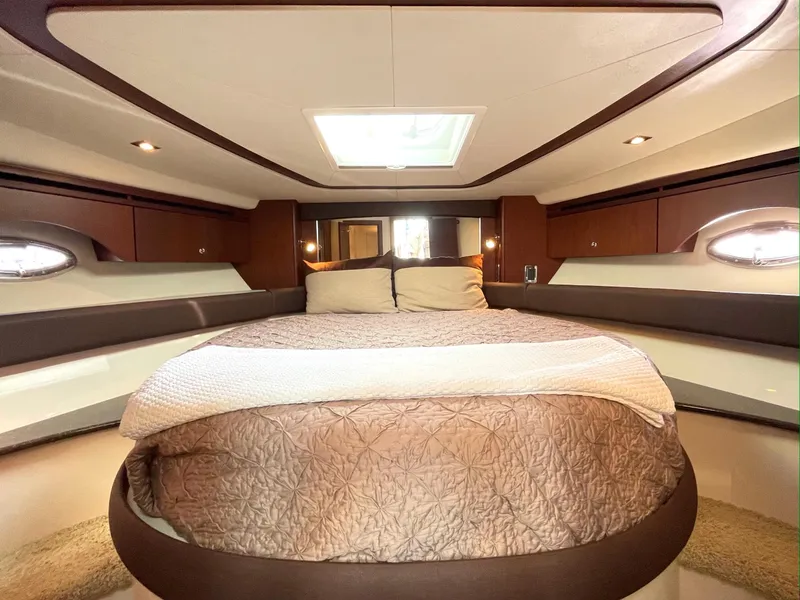 Slide: The Image of Luxurious bedroom interior of 2012 Meridian 441 Sedan yacht with elegant bedding. - 25